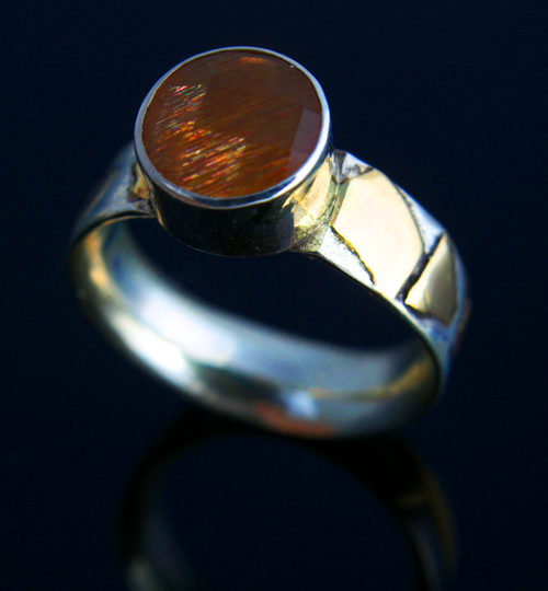 Handcrafted ring with amber stone setting by Scott Fowler